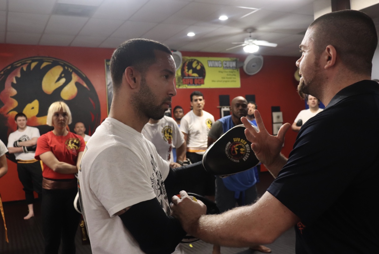 sifu justin och training student in wing chun kung fu technique