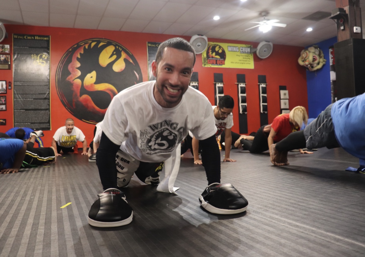 wing chun training class, man doing pushups