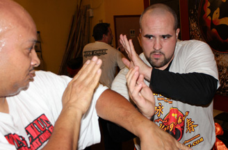 sifu och wing chun redirection changing angles direct attack chi sau Wing Chun principles; Shortest Distance